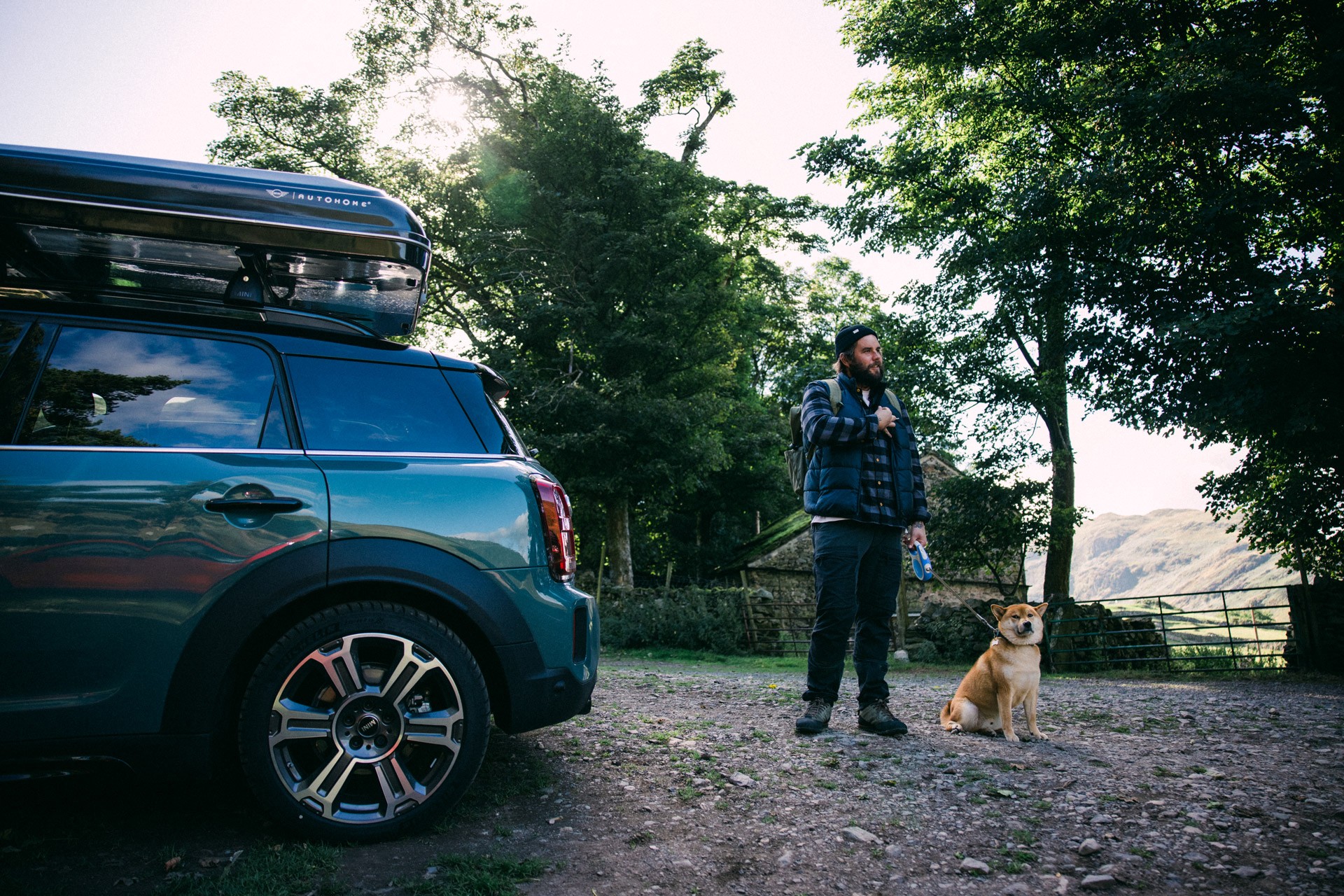 A collage of Jeffrey Bowman in his MINI Cooper S ALL4 Countryman Plug-In Hybrid traveling through England’s Lake District National Park.